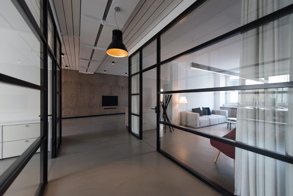 A view of an apartment with glass walls